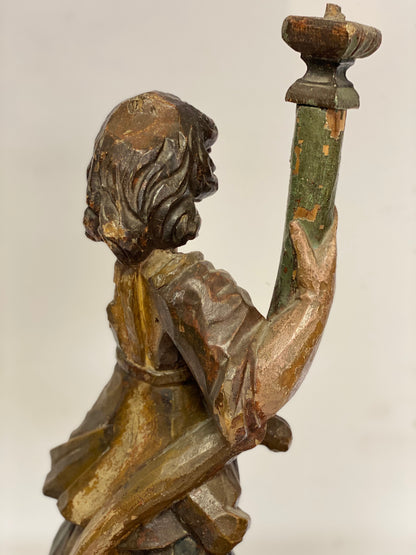 Wooden sculpture Angel holding torch. 17th century Lombardy