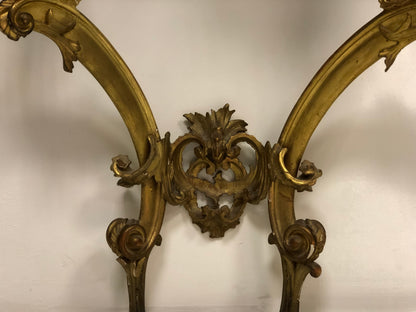 Console carved and gilded in pure gold leaf
