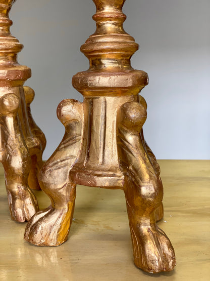 Gruppo di quattro candelieri in foglia oro . Lombardia epoca impero