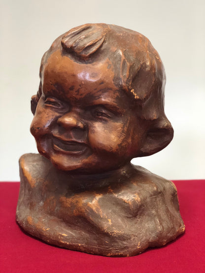 Testina di fanciullo in terracotta dell' 800