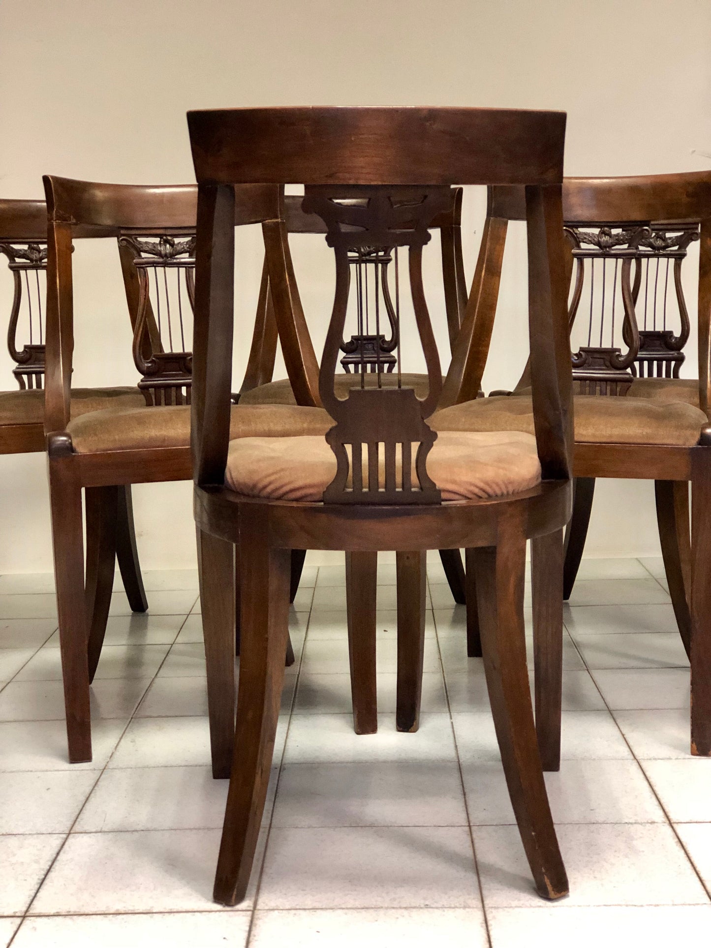 Group of six walnut chairs. Late 19th century