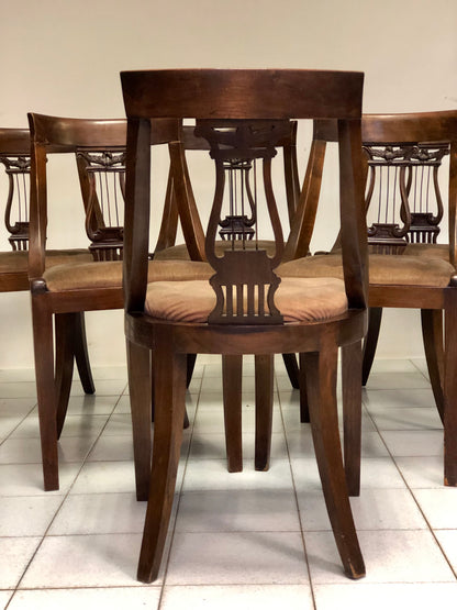 Group of six walnut chairs. Late 19th century