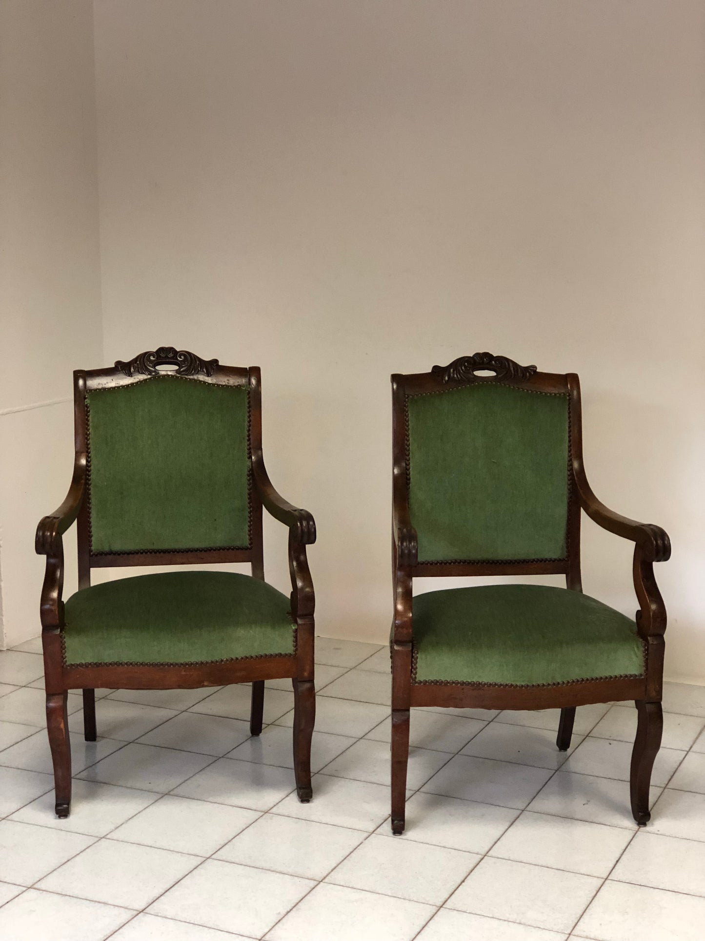 Pair of Lombard Empire Walnut Armchairs. Early 19th Century