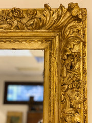 Specchiera in legno intagliato e dorato. Lombardia XIX secolo