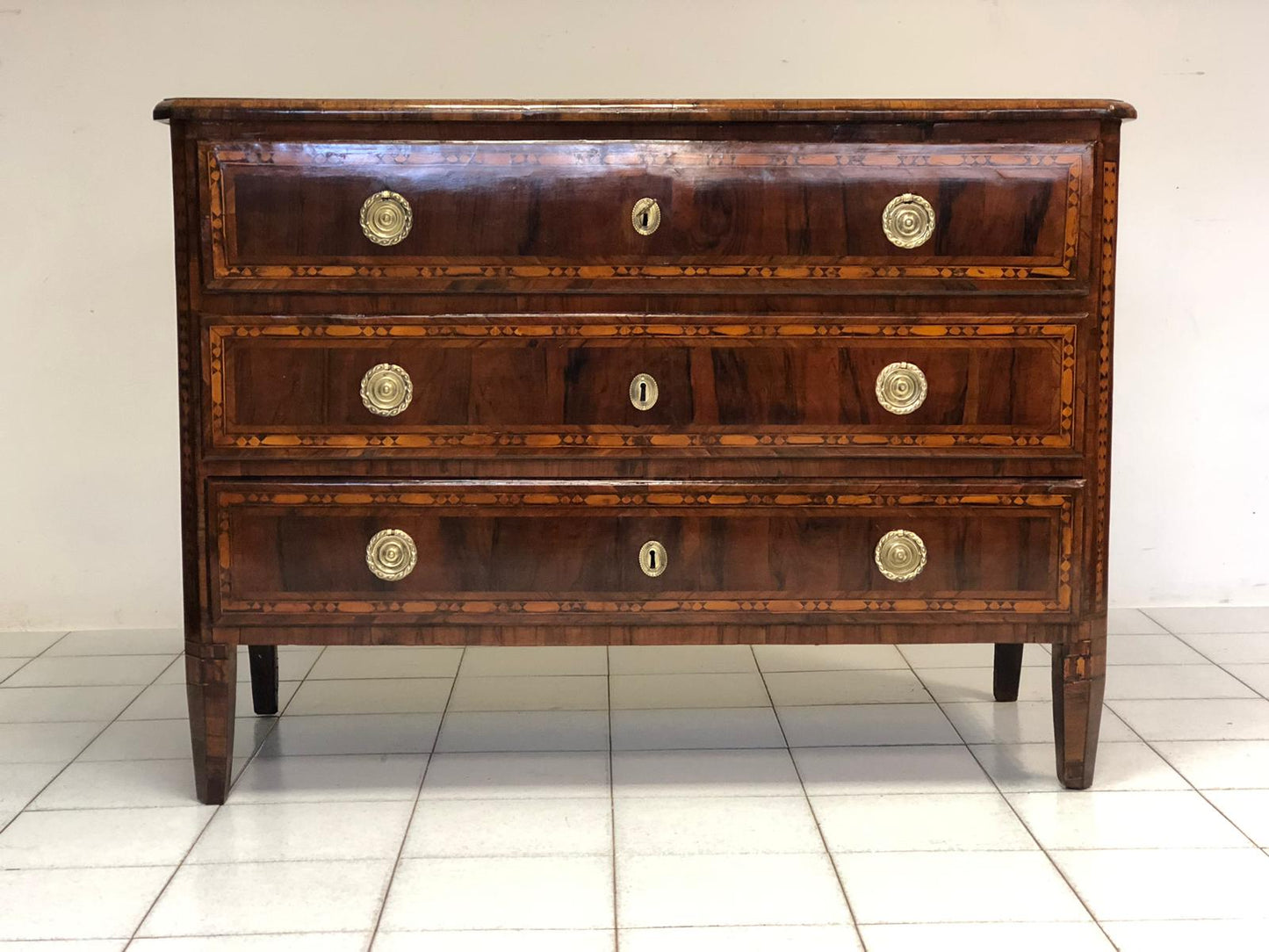 Louis XVI Lombard chest of drawers with figures. 18th century