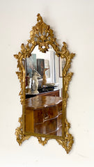 Specchiera in legno intagliato e dorato