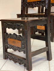 Gruppo di sei sedie lombarde in noce . Inizio XVII secolo