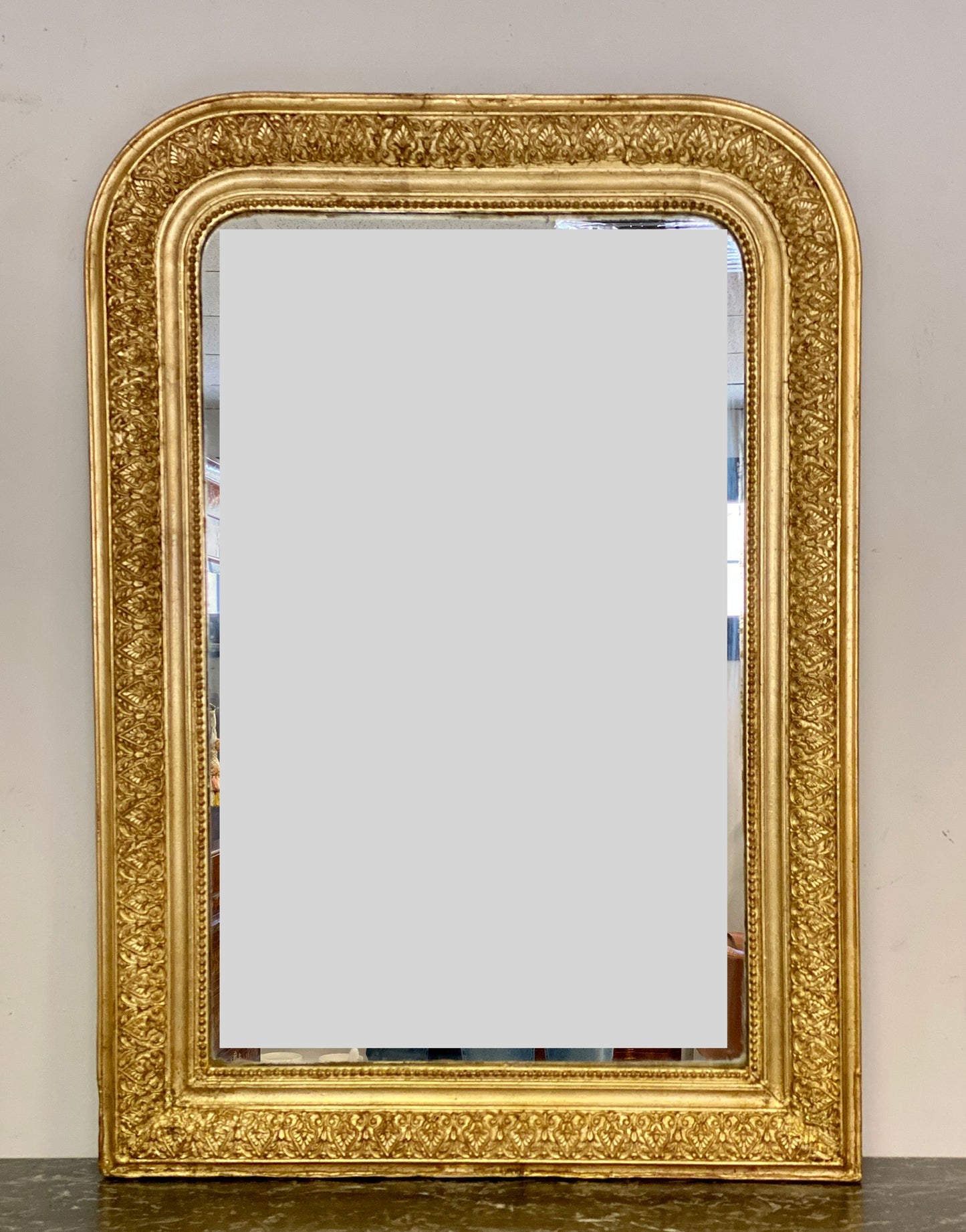 Carved gilded wooden mirror. 19th century