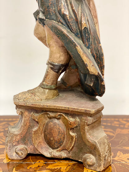 Wooden sculpture Angel holding torch. 17th century Lombardy