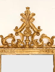 Specchiera veneziana in legno intagliato dorato. Fine XIX
