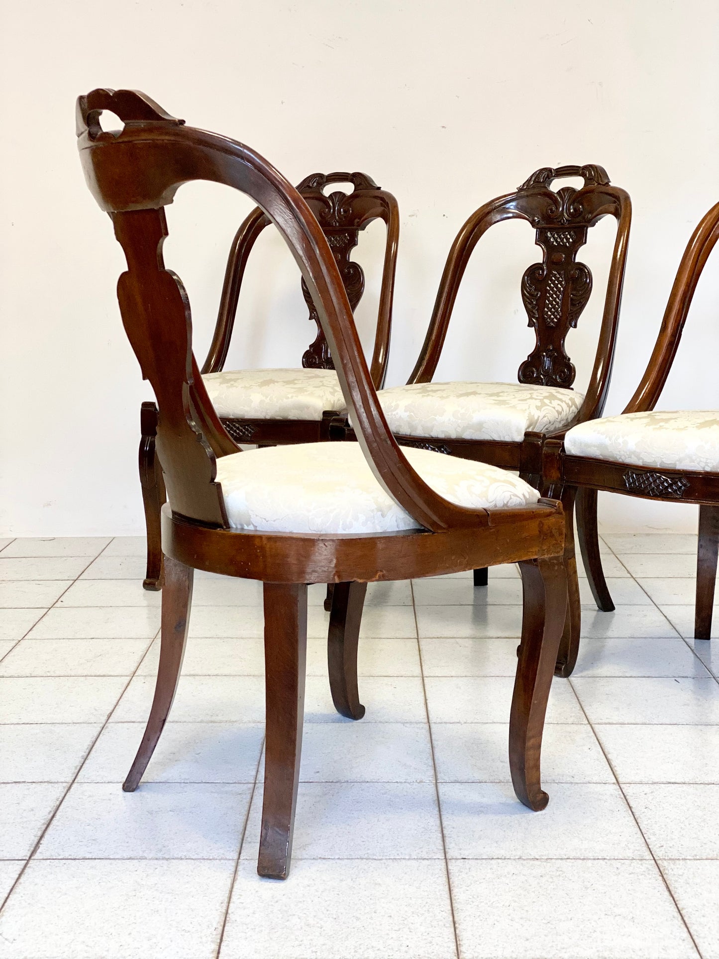 Group of four Lombard Charles X gondola empire chairs. Early 19th century