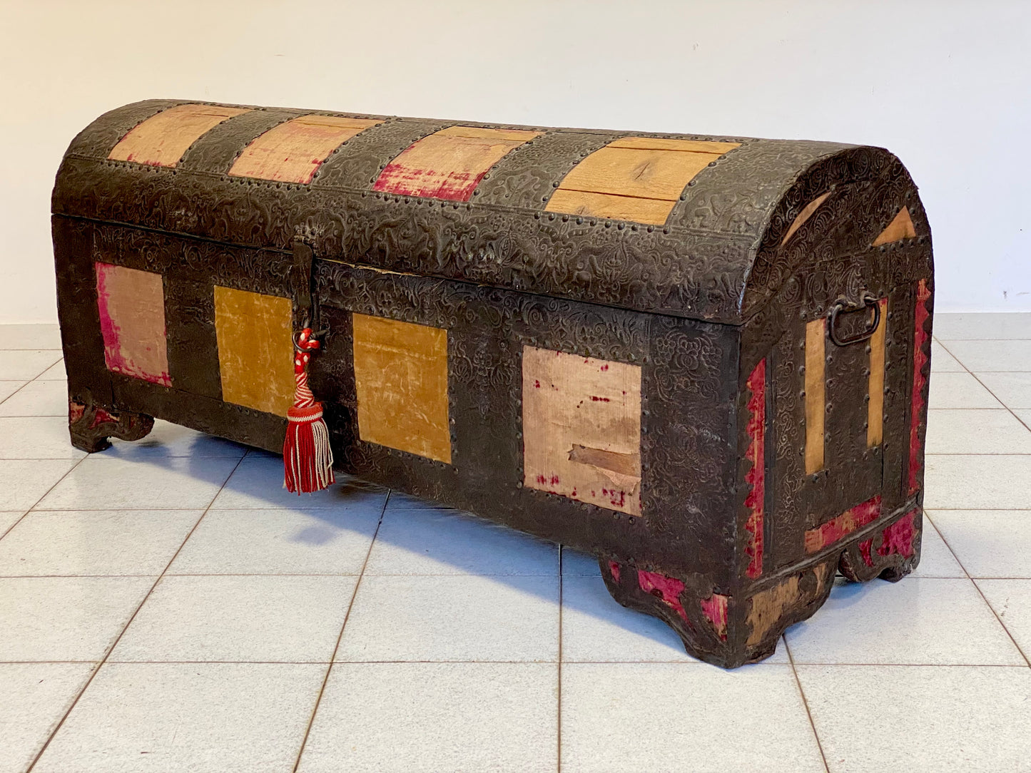 Chest covered in embossed sheet metal and velvet panels. Venice 16th century