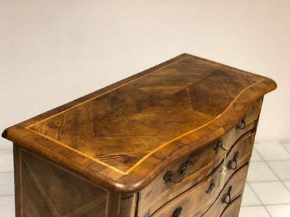 Louis XV chest of drawers with curved front