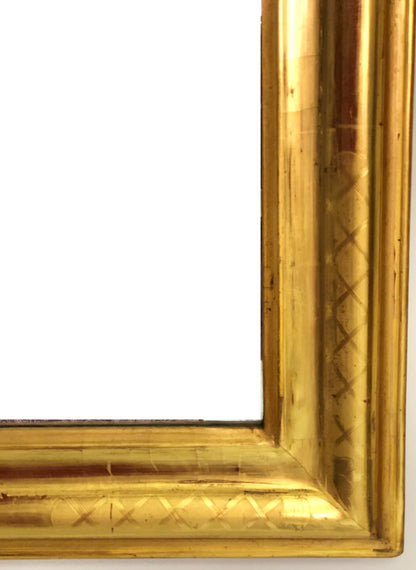 Specchiera in foglia oro zecchino con cimasa traforata