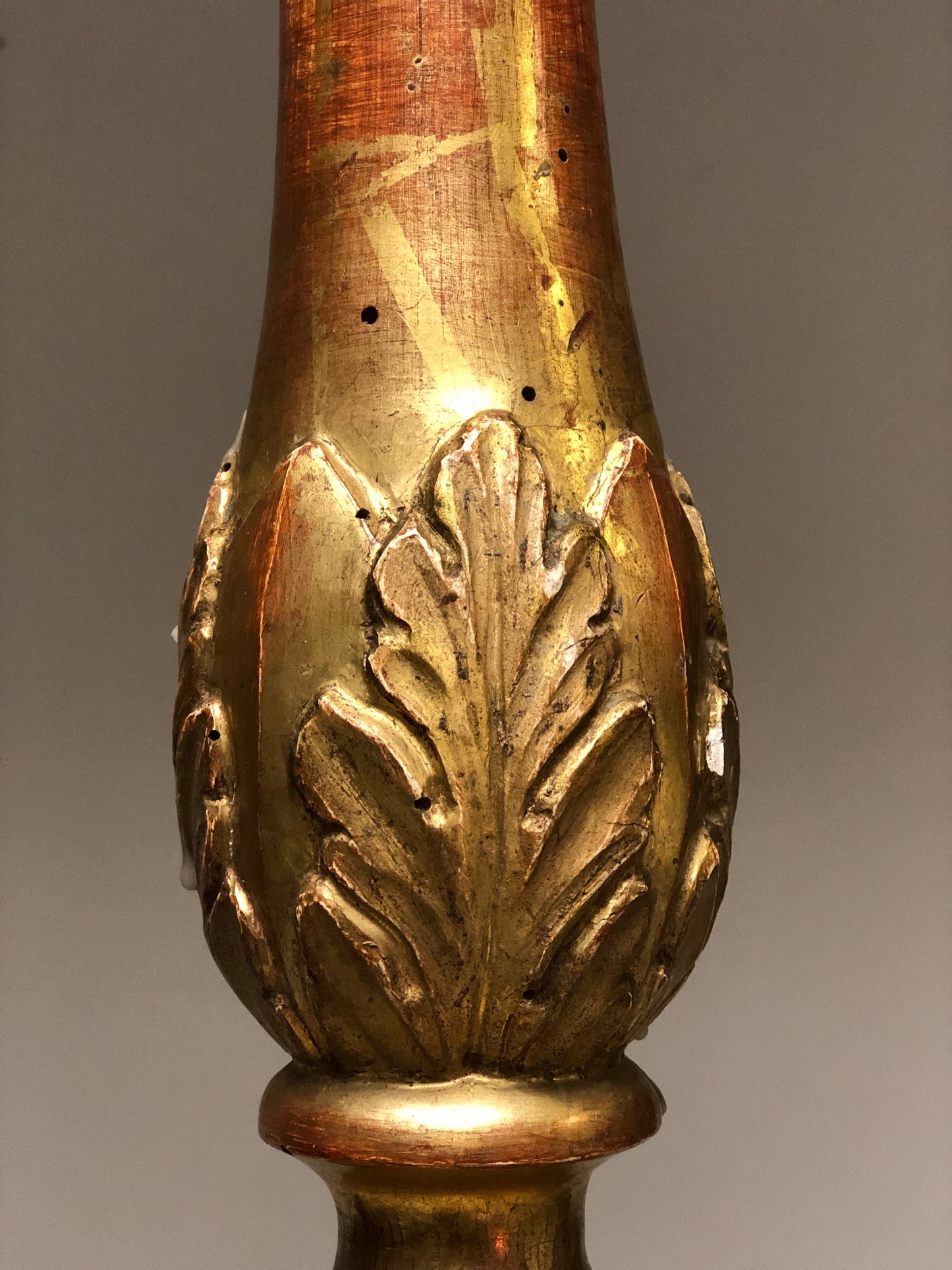 Carved and gilded wooden candlestick in gold leaf Lombardy early 18th century