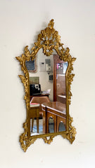 Specchiera in legno intagliato e dorato