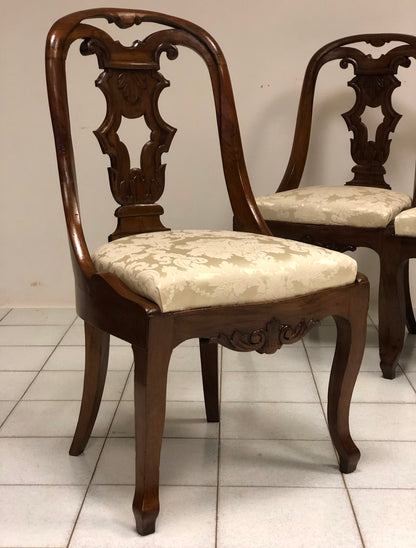 Group of four Charles X gondola chairs. Early 19th century