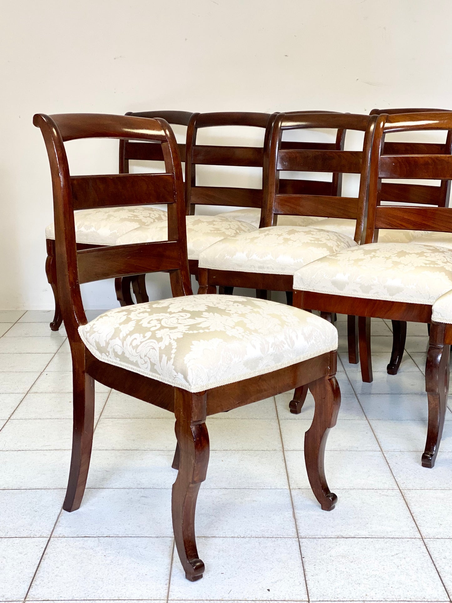 Group of ten Charles X walnut chairs, first half of the 19th century