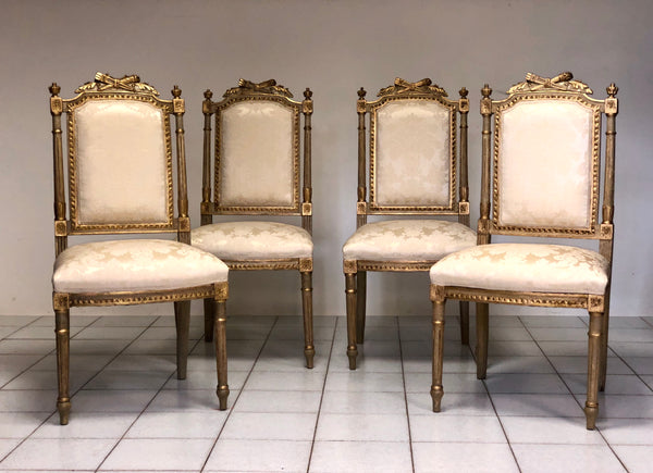 Gruppo di quattro sedie in lacca e oro . Francia Napoleone III
