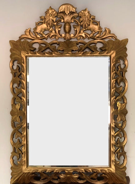 Specchiera in legno intagliato e dorato . Inizio XIX secolo