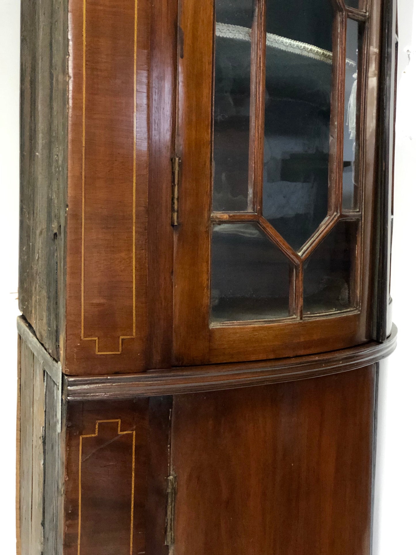 Inlaid curved corner cabinet, mid 19th century