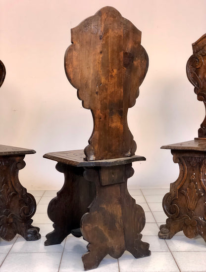 Group of three carved stools. 19th century