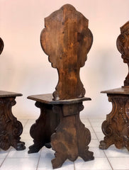 Gruppo di tre sgabelli intagliati . XIX secolo