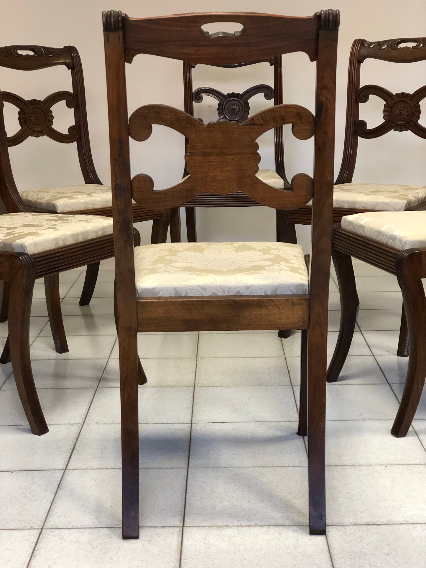Six Lombard Carlo X walnut chairs