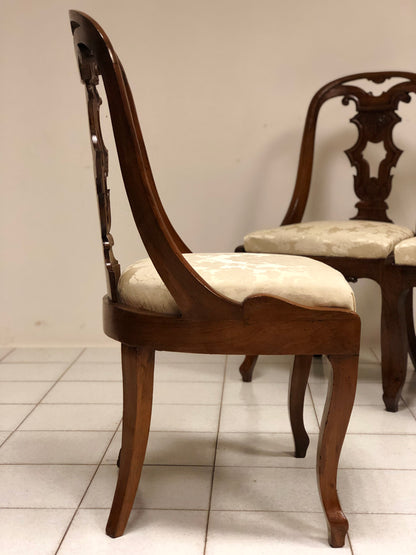 Group of four Charles X gondola chairs. Early 19th century