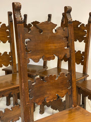 Gruppo di sei sedie lombarde in noce. Fine XIX secolo