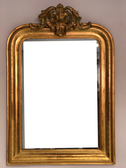 Mirror in pure gold leaf with perforated top