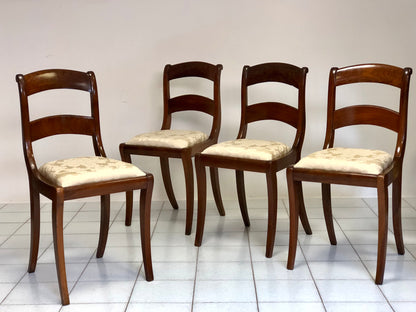 Gruppo di quattro sedie in noce emiliane Carlo X .