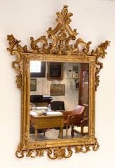 Specchiera veneziana in legno intagliato dorato. Fine XIX