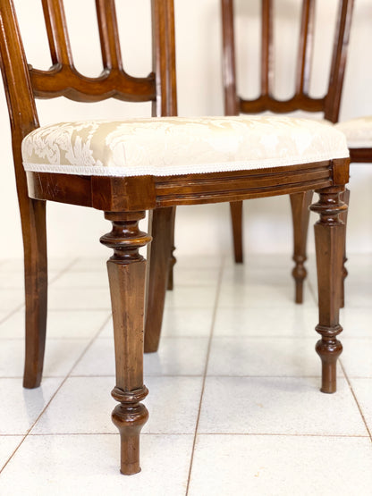 Group of four Lombard walnut chairs, mid-19th century
