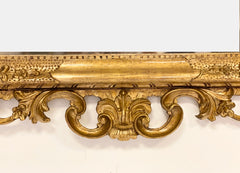 Specchiera veneziana in legno intagliato dorato. Fine XIX