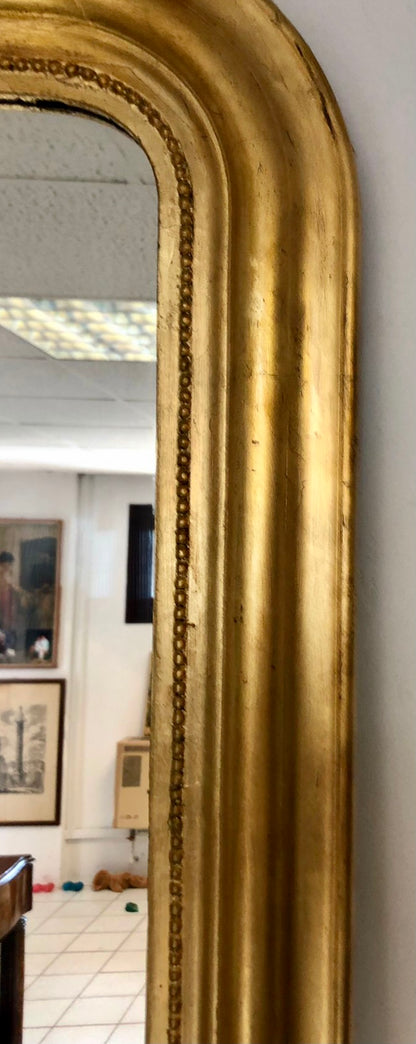 Gilded carved wooden mirror. 19th century