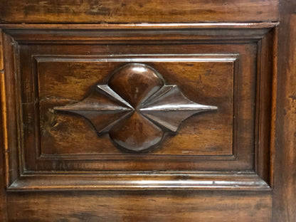 Walnut wardrobe with cloverleaf. Genoa 17th century
