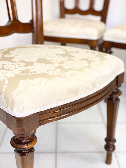 Group of four Lombard walnut chairs, mid-19th century