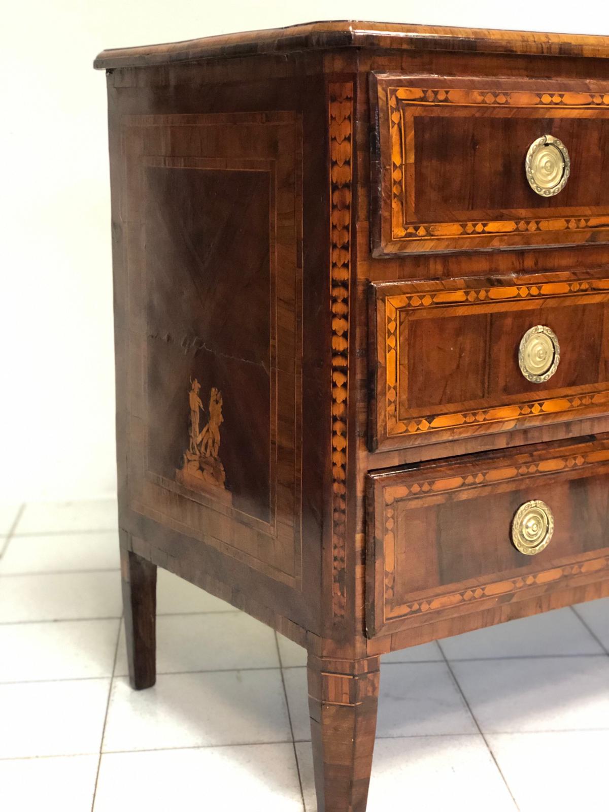 Louis XVI Lombard chest of drawers with figures. 18th century