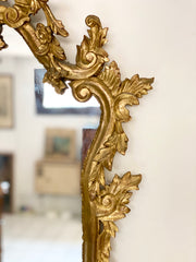 Specchiera in legno intagliato e dorato