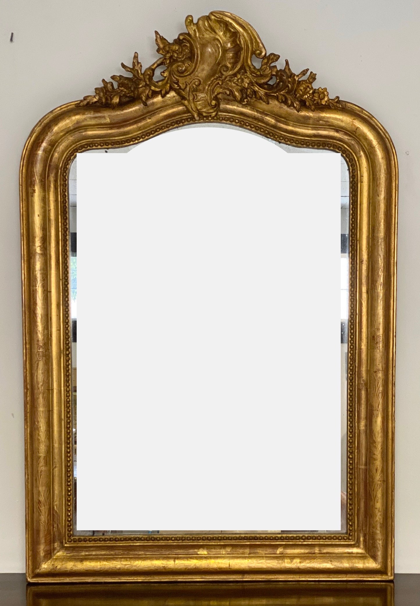 Specchiera legno intagliato dorato. XIX secolo . Restaurata