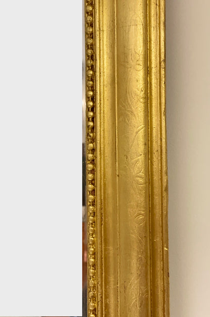 Specchiera lignea in foglia oro . Metà XIX secolo