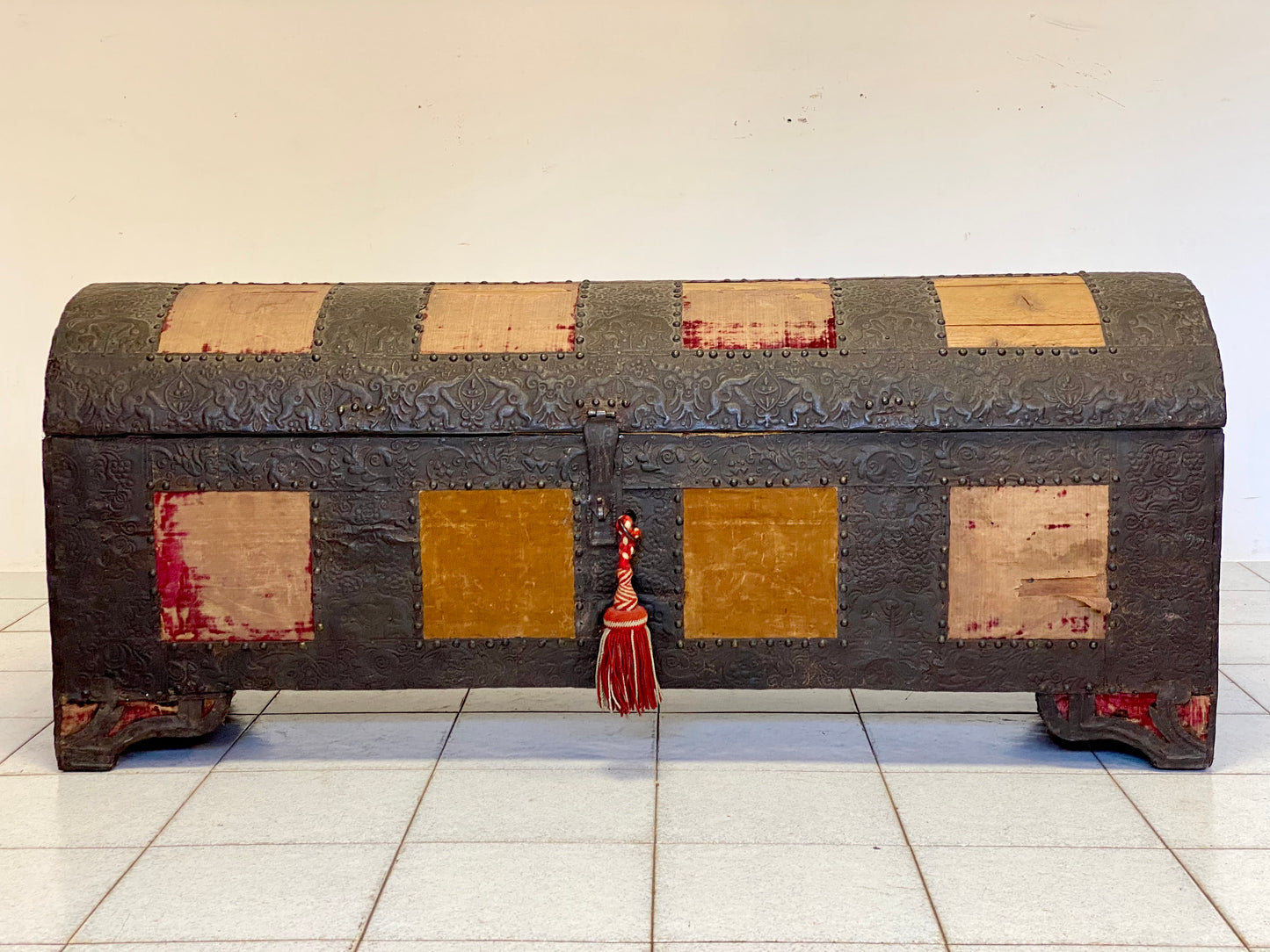 Chest covered in embossed sheet metal and velvet panels. Venice 16th century