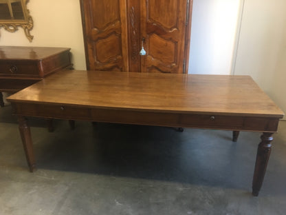 Walnut table from the Charles X era with truncated pyramid legs. 233 X 108