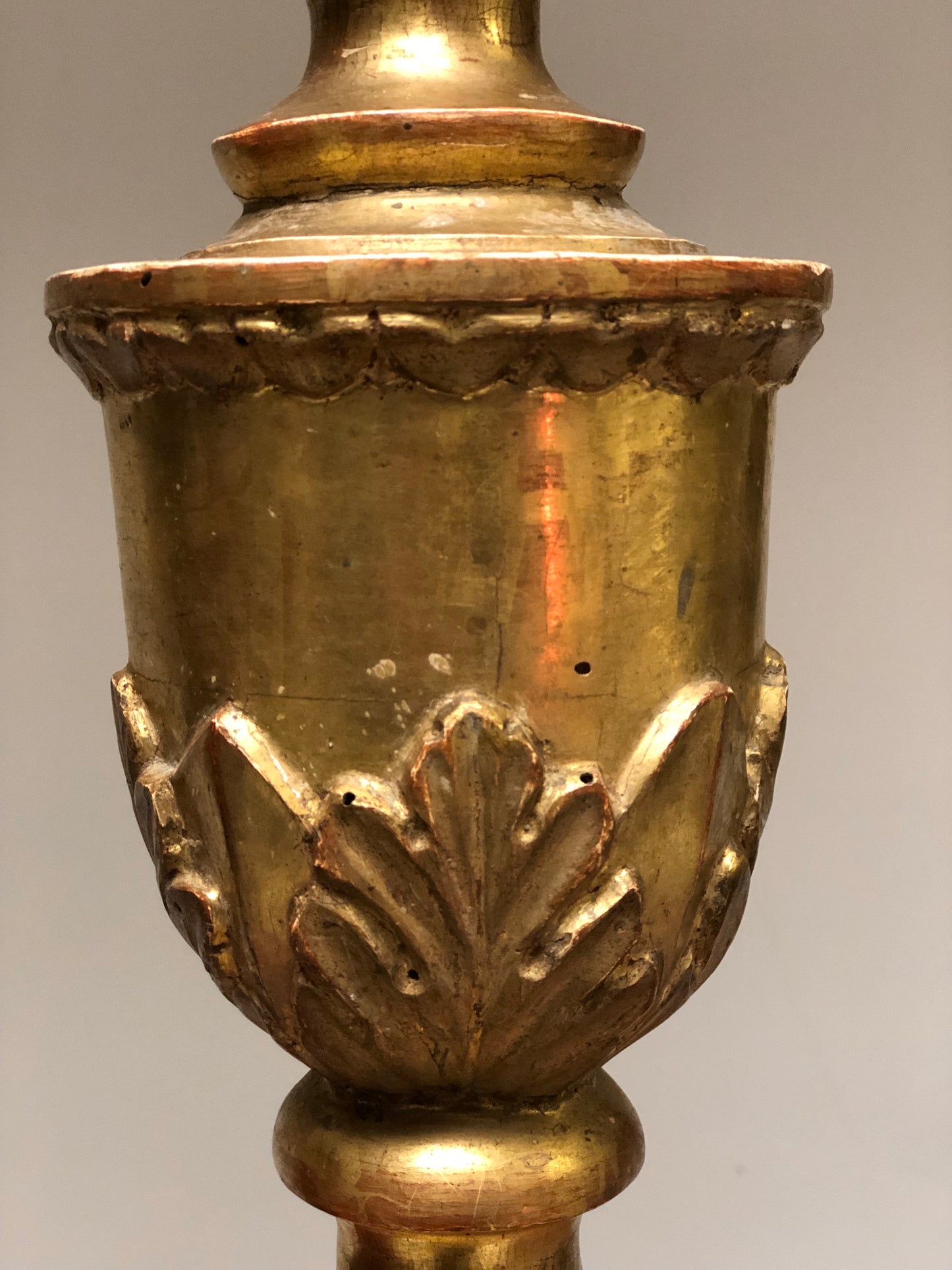 Carved and gilded wooden candlestick in gold leaf Lombardy early 18th century