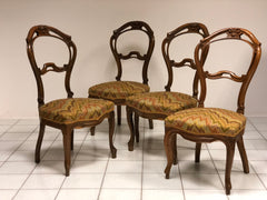 Gruppo di quattro sedie in noce lombarde metà 800