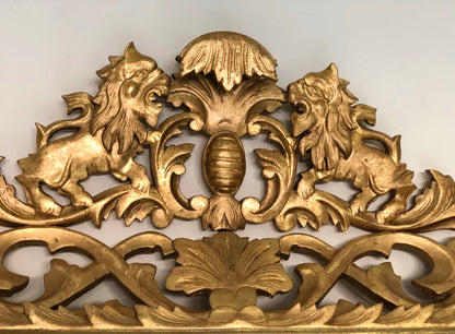 Specchiera in legno intagliato e dorato . Inizio XIX secolo