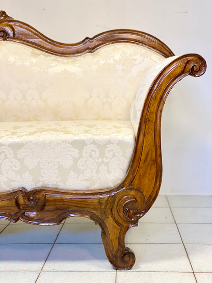 Lombard boat-shaped sofa in walnut Charles X