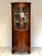 Inlaid curved corner cabinet, mid 19th century