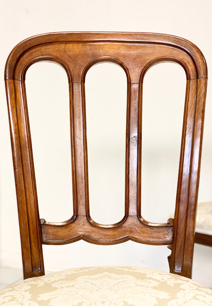 Group of four Lombard walnut chairs, mid-19th century